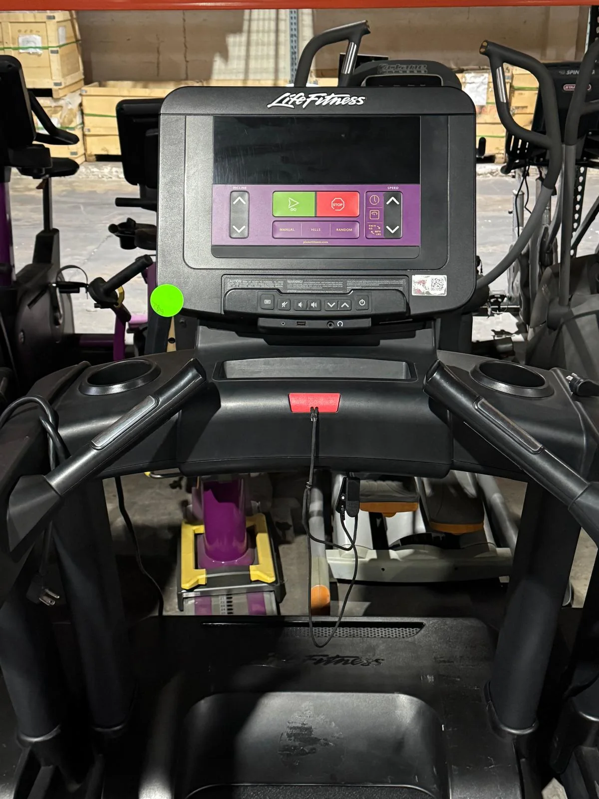 Life Fitness Integrity treadmill C Console with current purple overlay and safety stop key