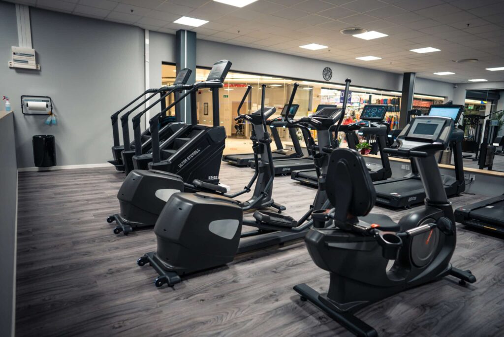 Body Masters gym equipment in a commercial fitness center.