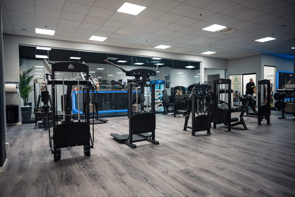 Hammer Strength gym equipment with commercial weight machines.