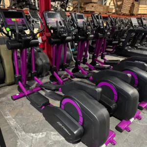 Pre-owned Life Fitness Integrity elliptical with C Console and current purple overlay — angled view