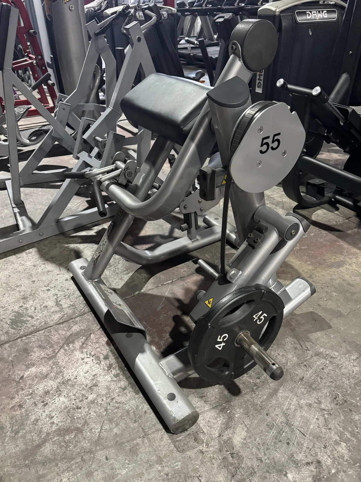Pre-owned Life Fitness Signature Series plate-loaded biceps curl — side view
