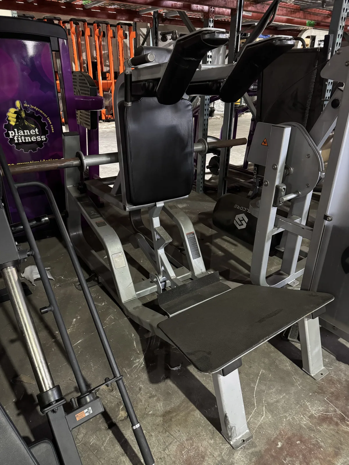 Pre-owned Precor Icarian Power Squat — angled view